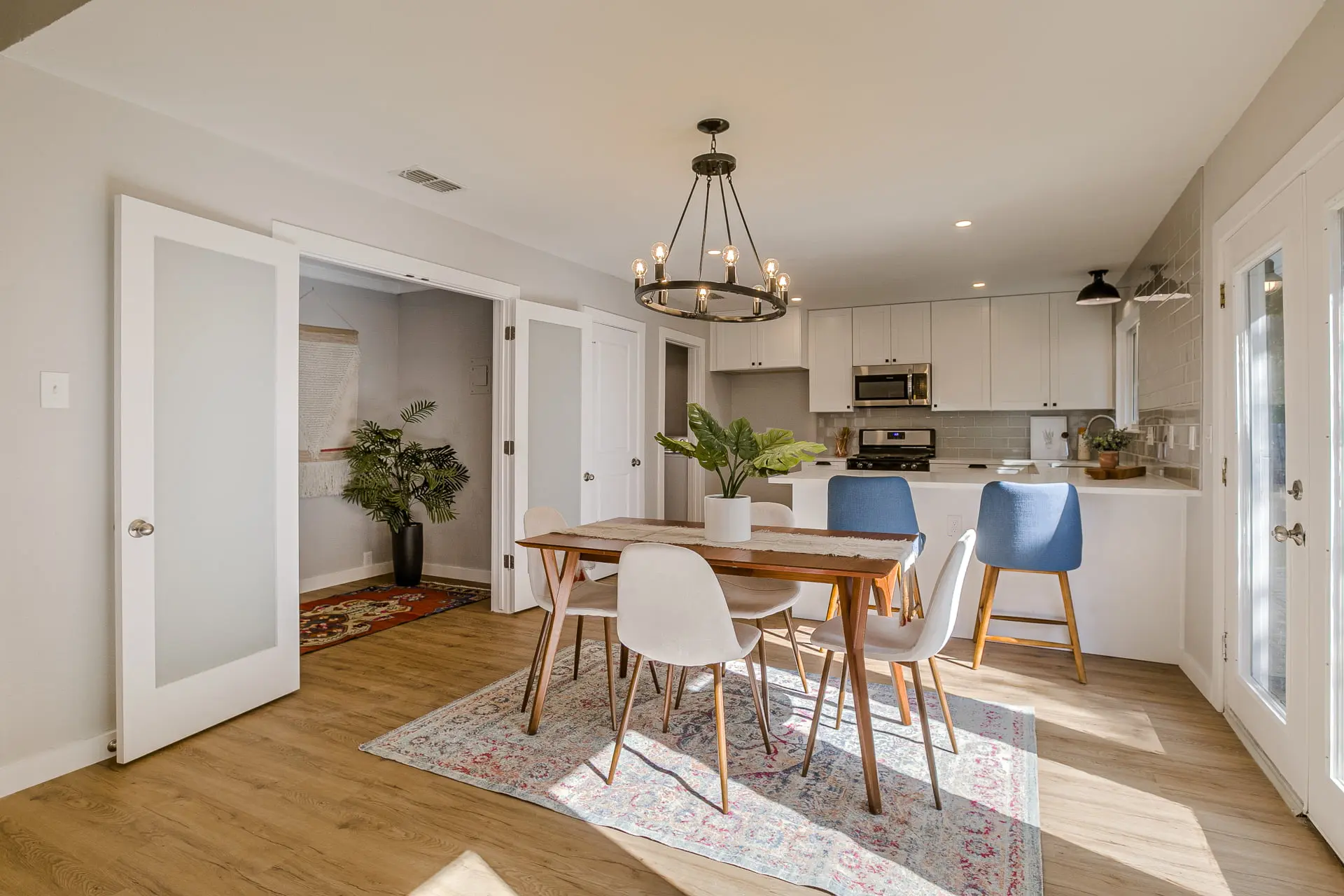 a dining room with a table and chairs